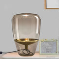 glas-tischlampe-wohnzimmer-elegante-innenraumbeleuchtung-modern-xlumina