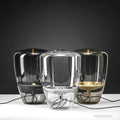 glas-tischlampe-wohnzimmer-elegante-innenraumbeleuchtung-modern-xlumina