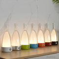 bottleglow-tischlampe-stimmungsvolle-beleuchtung-wohnzimmer-modern-xlumina