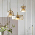 hailie-retro-led-haengeleuchte-goldene-amber-metall-glas-schlafzimmerbeleuchtung-xlumina