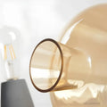 leimu-amber-tischlampe-glas-betonbasis-modern-dekoration-xlumina