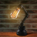 liquidluxe-kreative-eisenTischlampe-industrial-waterpipe-design-e27-fassung-schwarz-bronze-xlumina