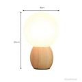 lumiorb-nachttischlampe-holzfuß-rund-design-led-beleuchtung-warmes-licht-xlumina
