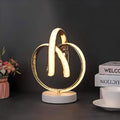 minimalistische-led-tischlampe-gebogenes-design-modern-stilvolle-beleuchtung-xlumina4