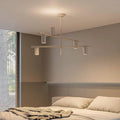 nyxia-luxuriose-led-hangelampe-gold-schwarz-warmweiss-modern-wohnzimmer-xluminia2