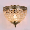 retrocrystal-kronleuchter-eleganter-retrodesign-kristall-wohnzimmer-gold-schwarz-xlumina2