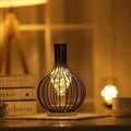 retroera-minimalistische-hohle-Tischlampe-xlumina