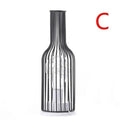 retroera-minimalistische-hohle-Tischlampe-xlumina