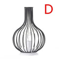 retroera-minimalistische-hohle-Tischlampe-xlumina