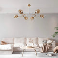 uranos-luxus-haengelampe-schwarz-gold-modern-industriebeleuchtung-xlumina3