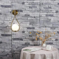 zenithglas-wandlampe-metall-glas-modern-elegant-innenbeleuchtung-gold-schwarz-xlumina4